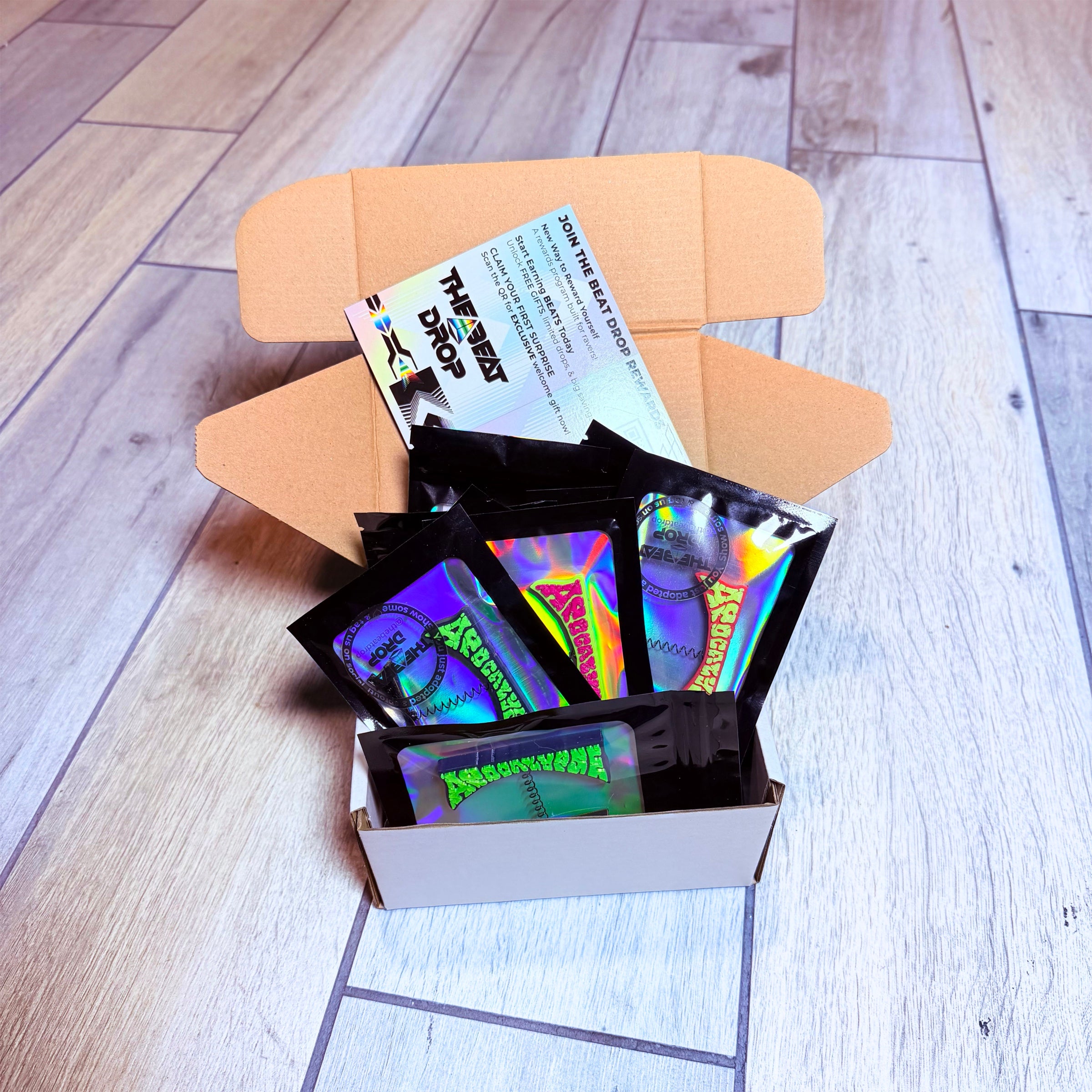 Apocalypse rave sprout multi-color — EDM bass music festival hair clip accessories packaged in a white box with a post card