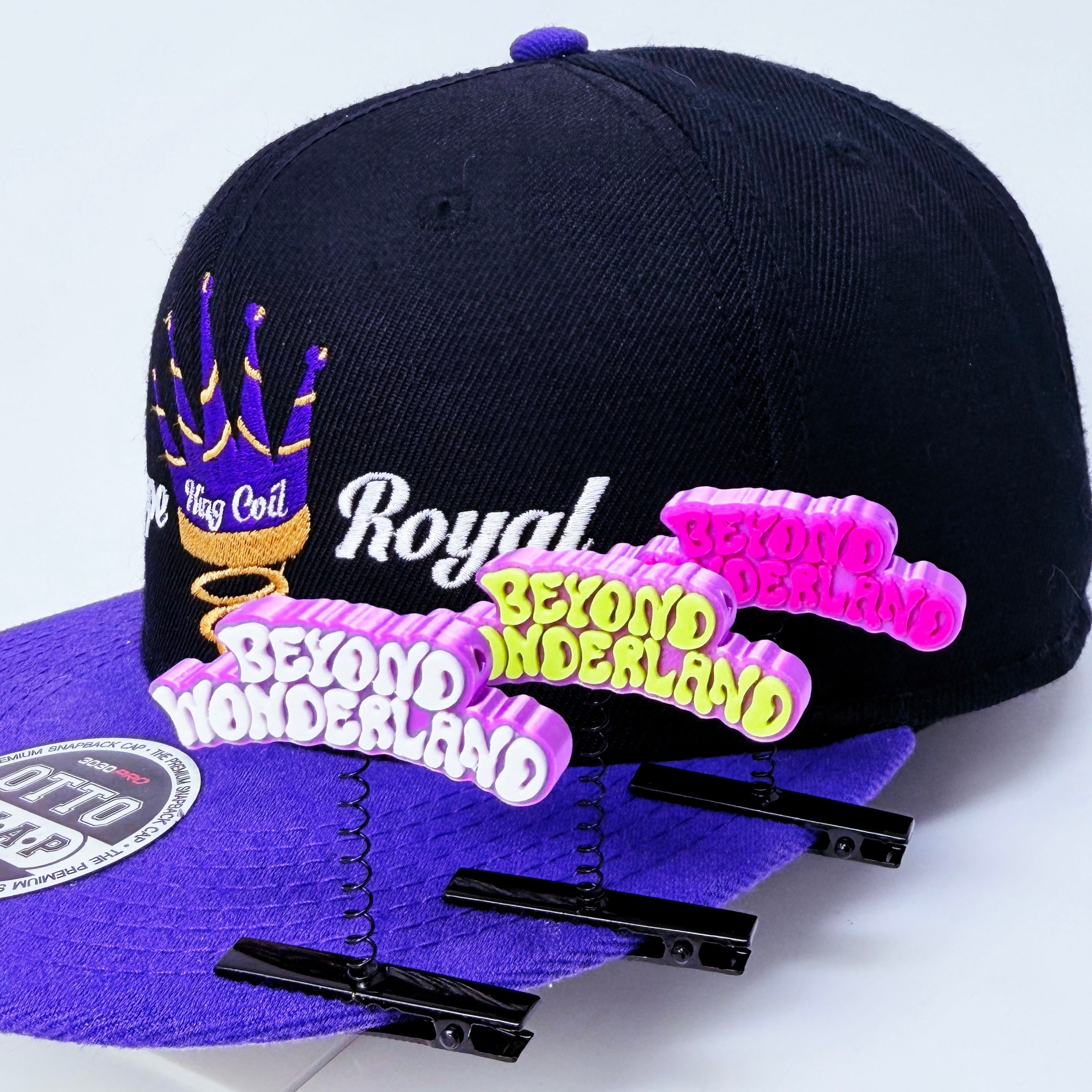 Beyond Wonderland Rave Sprouts all three colorways clipped to black and purple snapback rave hat – Pink & Pink, Purple & Yellow, Purple & White festival hat clip EDM accessory music festival gift