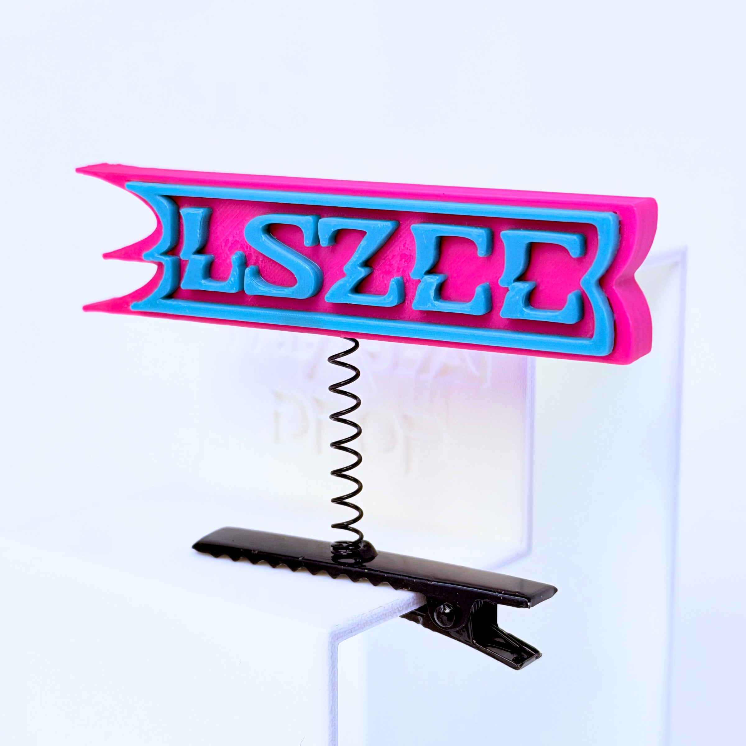 LSZEE pink background and blue text rave sprout — CloZee LSDream EDM festival hair clip accessory