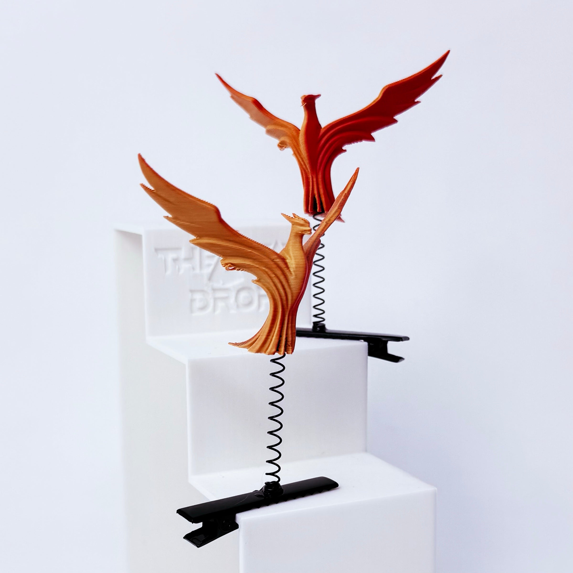 Illenium phoenix fire bird rave sprout — gold and red winged phoenix kandi clip duo