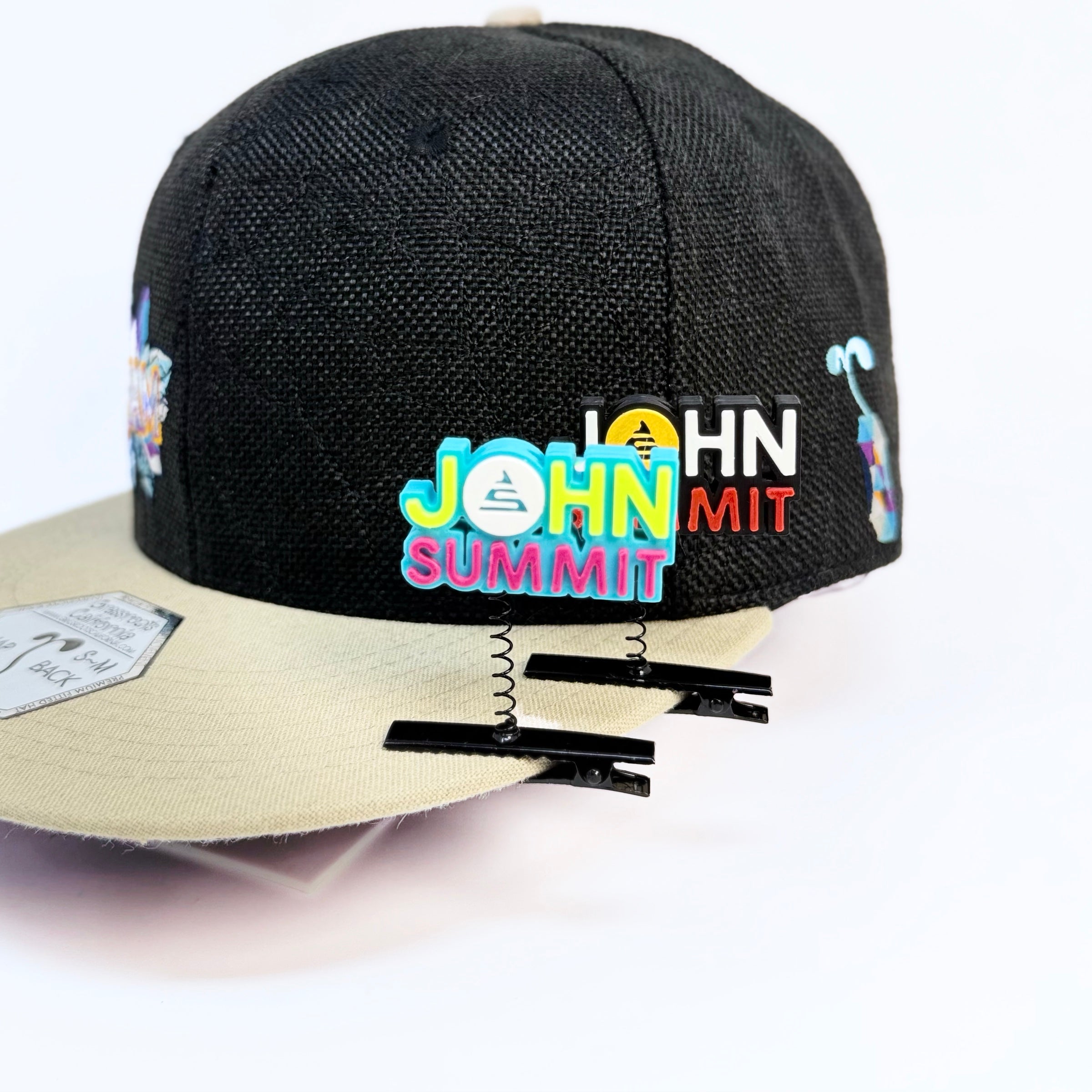John Summit rave sprout blue and black 3D printed festival hair clip rav accessory on a black hat